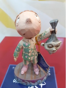 Timmy with Shrunken Head Figurine